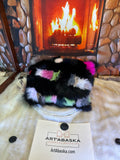 Coussin décoratif Danielle en fourrure recyclée en renard recyclé cousus en lanières style patchwork